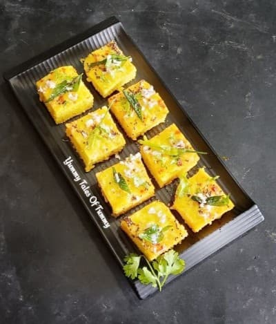 Raw Mango Dhokla Recipe Topped With Sweet Mango Chutney